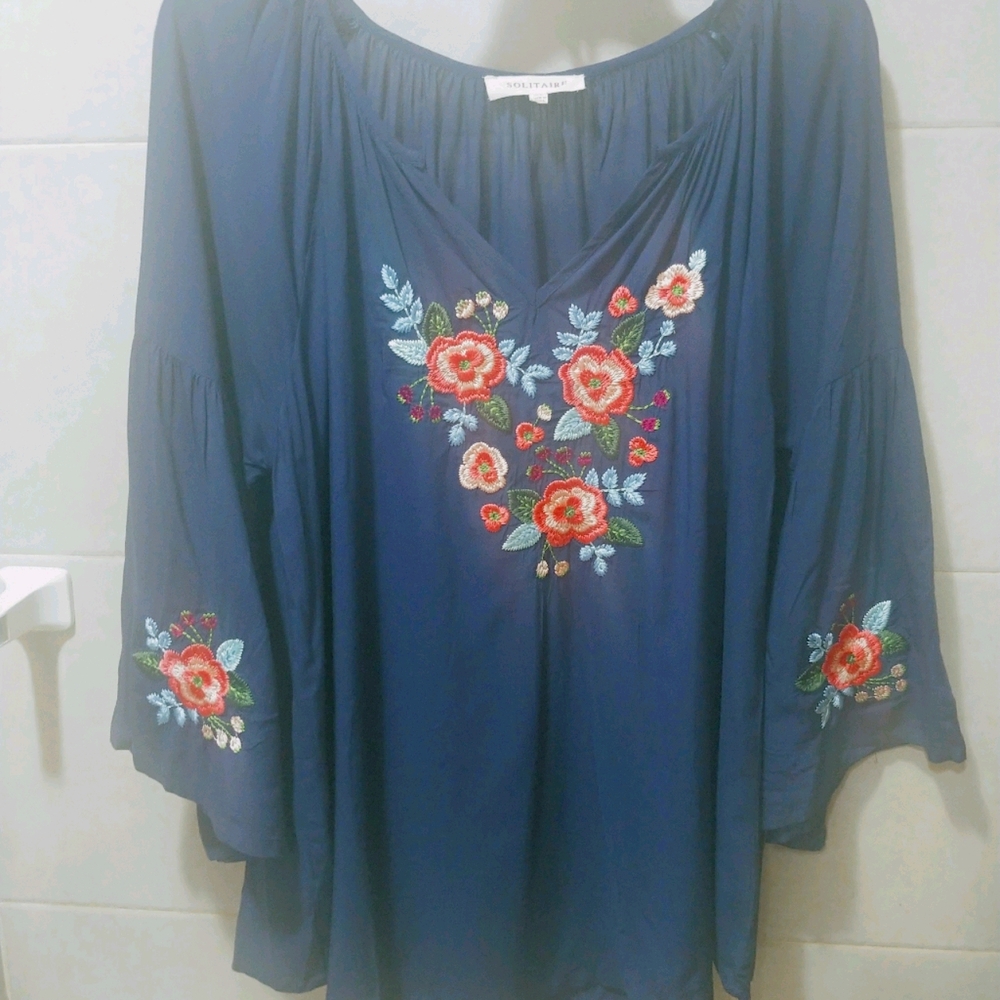 Flower embroidered peasant blouse